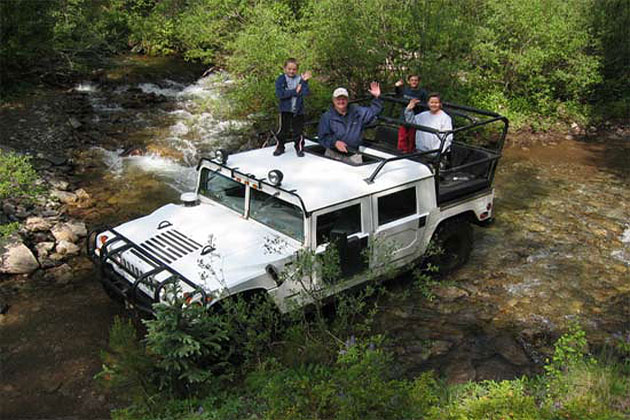 Hummer in Creek