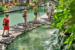 Strolling by Riverwalk Falls