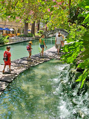 Strolling by Riverwalk Falls