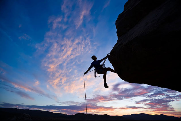 Climber Rappelling Sunset Joshua Tree National Park